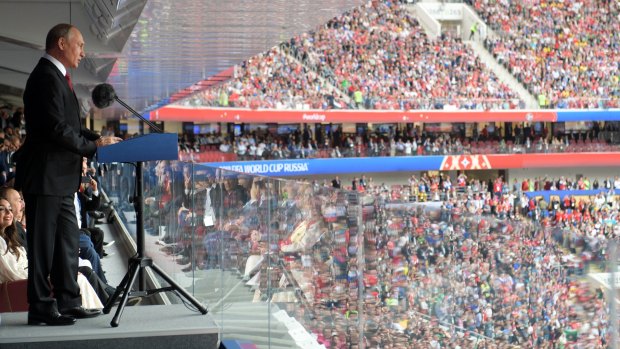 Vladimir Putin speaks at Luzhniki Stadium in Moscow before the opening match of the World Cup.