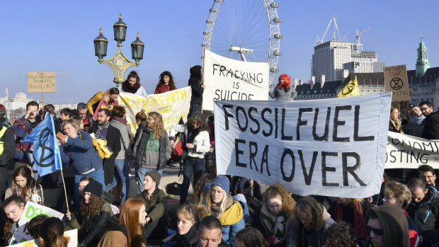 Hundreds of protesters block off London's main bridges last weekend to demand the British government take climate change seriously.