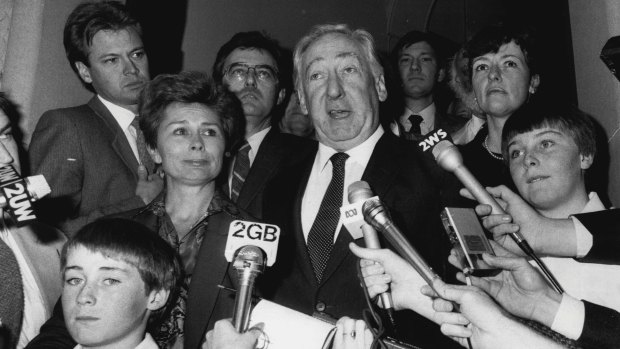 Justice Lionel Murphy with his family outside court after his acquittal at his second trial