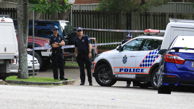 Police investigate the scene of a fatal shooting at Young Street, Petrie.