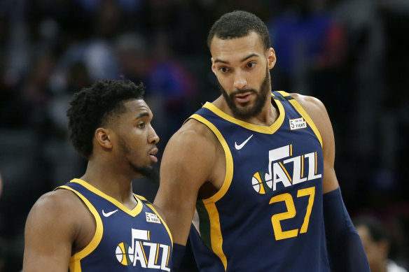 Rudy Gobert (right) has pledged a donation of more than $US500,000 to help various groups affected by the coronavirus pandemic.