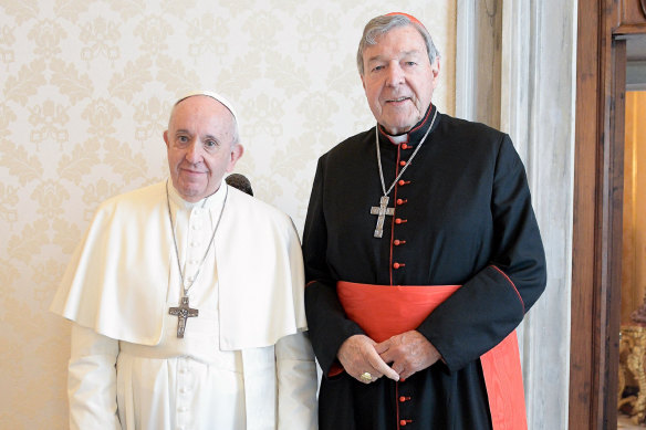 Pope Francis and Cardinal George Pell during their private meeting at the Vatican on Monday.