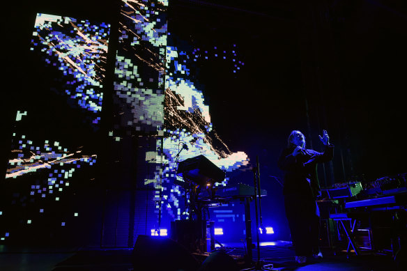 Thom Yorke’s performance was backdropped by live video graphics.