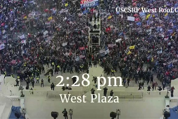 This image from video from a police worn body camera from the Jan. 6 riot at the US Capitol, was played as a committee exhibit.