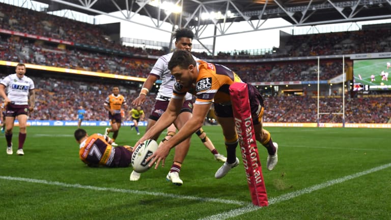 Broncos flyer Corey Oates soars into the corner for a try in a commanding performance. 