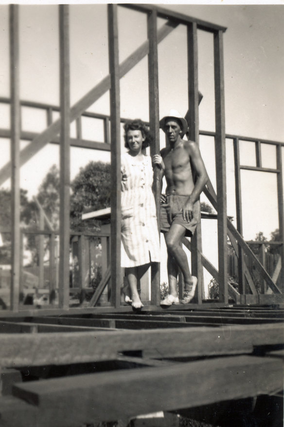 The author’s parents, pictured at their Albert Street house under construction.