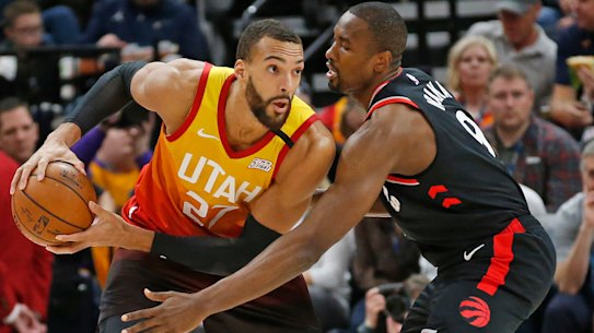 Serge Ibaka guards Rudy Gobert.