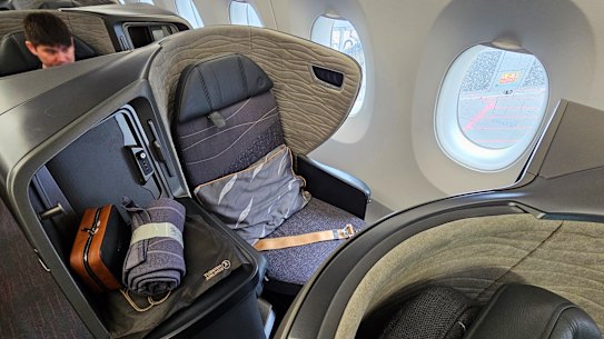 The seat has direct aisle access, but feels tight.