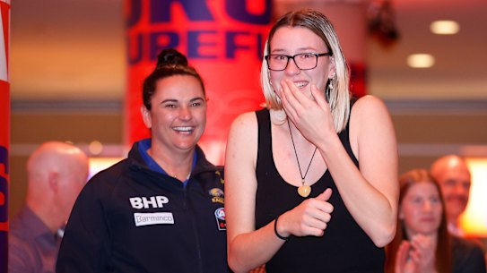 Zoe Wakfer heads up to the stage.