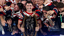 Victor Radley celebrates with the 2026 premiership trophy.