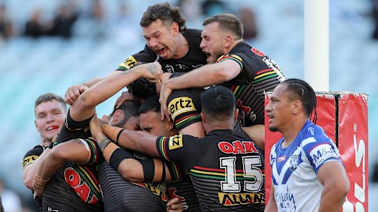 James Tamou crashes over the line for his first try of the season. 