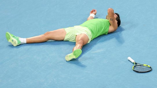 Carlos Alcaraz celebrates his staggering win.