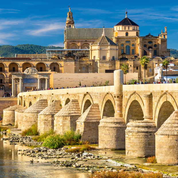 The Roman Bridge across the Guadalquivir river and the marvellous Mosque-Cathedral in Cordoba, Spain.