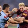 PERTH, AUSTRALIA - JUNE 26:  Cameron Munster of the Maroons is tackled during game two of the State of Origin series between New South Wales Blues and Queensland Maroons at Optus Stadium, on June 26, 2022, in Perth, Australia. (Photo by Mark Kolbe/Getty Images)