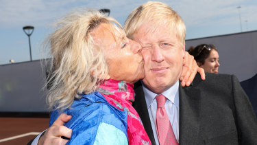 Johnson is kissed by a member of the public during a visit to the Port of Dover recently.