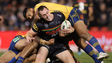 Isaah Yeo tries to break free from the Parramatta defence.