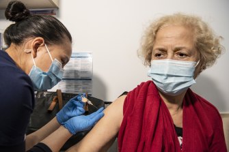 A patient receives her flu vaccination on Thursday. NSW Chief Health Officer Kerry Chant said that influenza immunisation rates aren’t where they need to be.