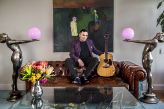Peter Freedman with Kurt Cobain's guitar which he bought in 2020 and will send on tour to highlight the plight of artists and musicians due to the pandemic.