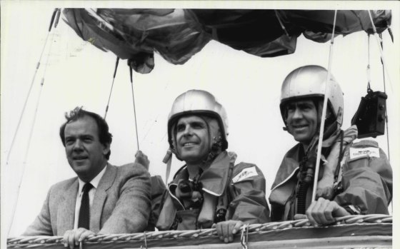 Mike Willesee with balloonists Julian Nott and Peter Anderson. His latest aeronautical feat is the subject of Balloons Away, a Willesee documentary, In preparation for an amazing around-the-world balloon trip in the jet stream at 10,000 metres, he chose a trans-Australia crossing to test his gear.
1985.