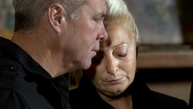 Harry Dunn's mother, Charlotte Charles, is comforted by a family member last year.