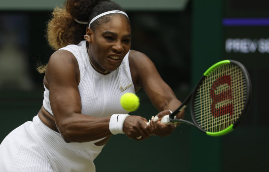 Serena Williams returns the ball to Alison Riske during their Wimbledon quarter-final on Tuesday.
