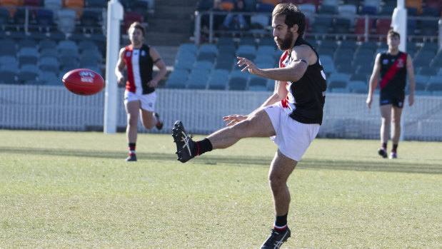 Ainslie’s Daniel Ledda kicks the ball. 