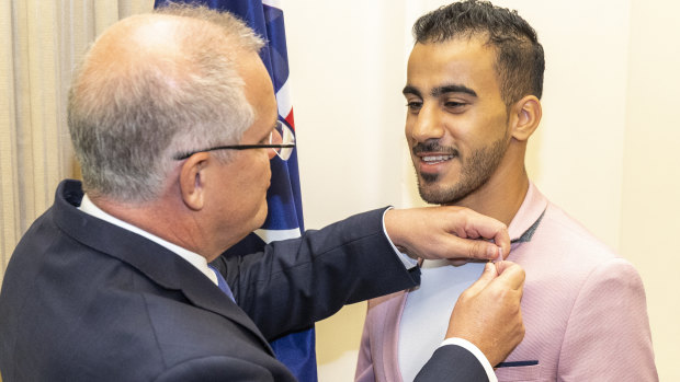 Hakeem Al-Araibi (right) with Prime Minister Scott Morrison at the citizenship ceremony. 