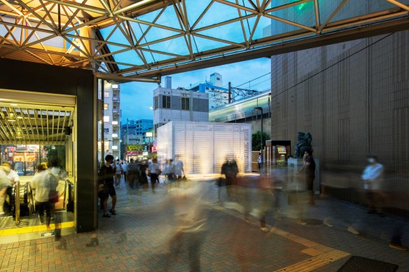 The futuristic, glowing restroom at Ebusi Station by Kashiwa Sato, part of The Tokyo Toilet project.