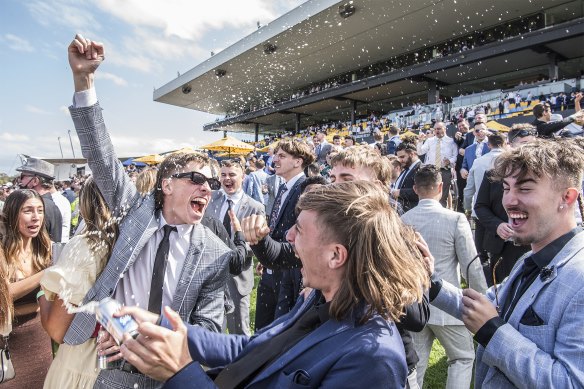 Punters celebrated at Rosehill Racecourse. 