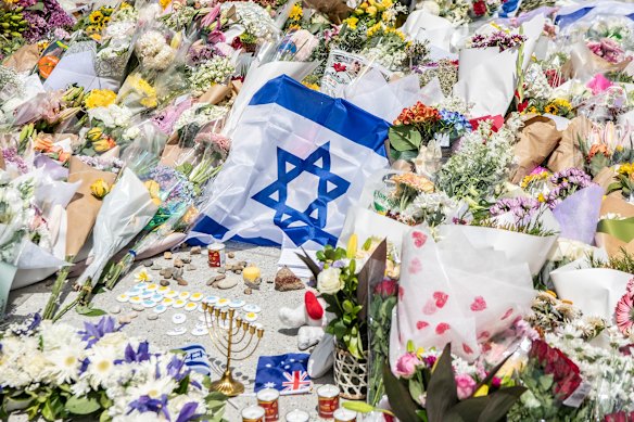 Flowers and flags have been left near Bondi Pavilion.