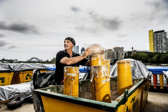 Fortunato Foti loads Sydney’s 2023 fireworks onto barges at Glebe Island.