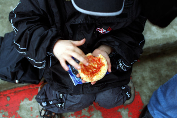 A pie with sauce at the footy, 2002.