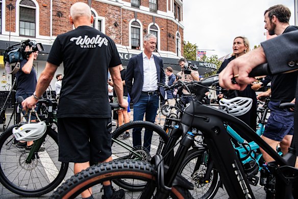 Transport Minister John Graham, centre, unveils his latest plans on Friday to address concerns about e-bikes.