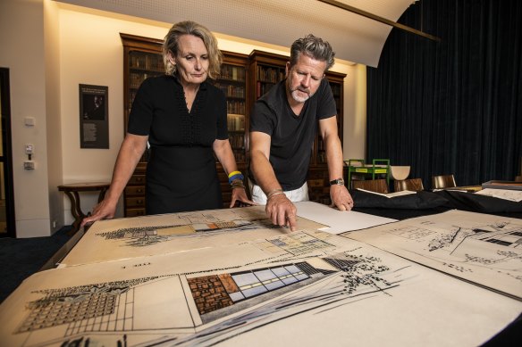 State librarian Caroline Butler-Bowdon and Tim Ross examine some of the Nino Sydney archive.