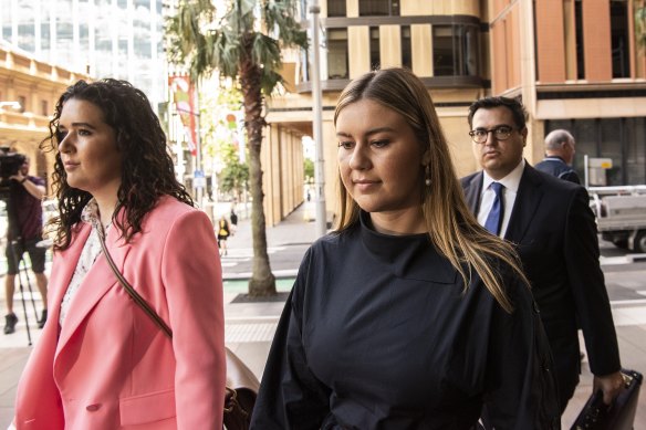 Brittany Higgins (centre) arriving at the Federal Court in Sydney in December.