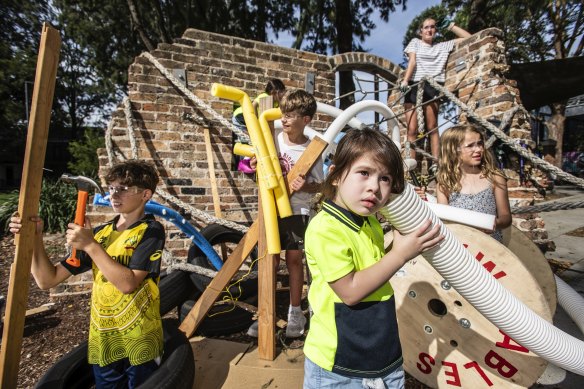 From left, Tristan Gill, Elizabeth Luong, Nate Grimm, Alice Luong, Freya Gill and Naomi Gill turn trash into treasure at a park in St Peters.