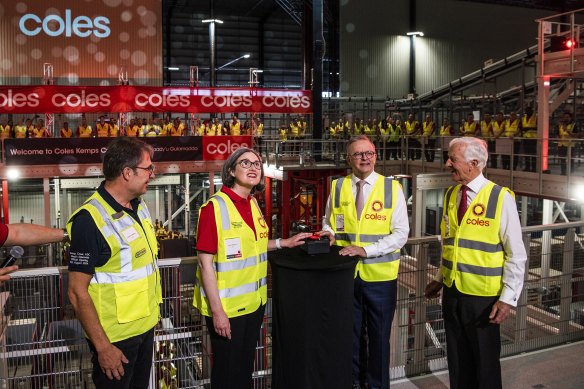 Prime Minister Anthony Albanese (centre right) with Coles chairman James Graham (right) and CEO Leah Weckert (centre left) in Kemps Creek on Tuesday.