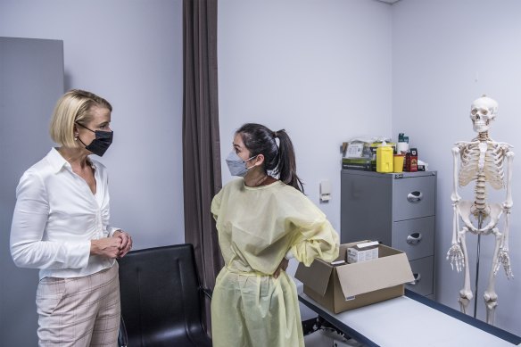 Labor frontbencher Kirstina Keneally with Chau Dang at a Cabramatta medical centre.