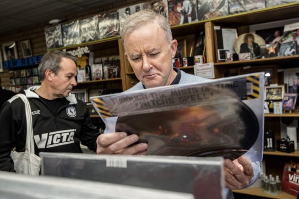 Anthony Albanese, inspecting records at RPM Records in Marrickville for 2021 Record Store Day.