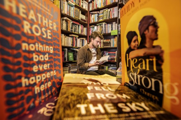 Gertrude and Alice bookshop customer Matt Defina explores the Bondi Beach store’s memoir section.