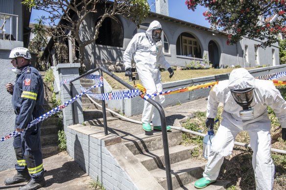 Fire investigators at the scene of Wednesday night’s blaze.