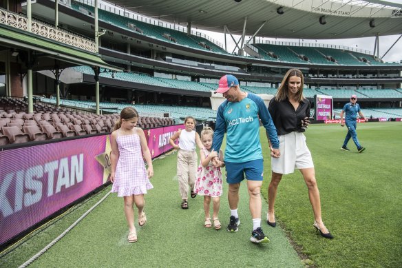 David Warner with his wife Candice and their children at the SCG on Monday.