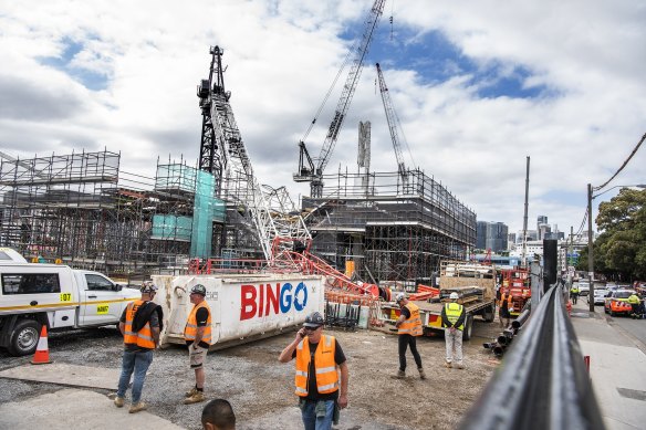 Emergency services were called about 12.30pm after the arm of the crane failed.