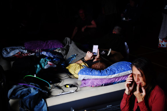 Lismore residents take refuge in a local evacuation centre on Monday morning.