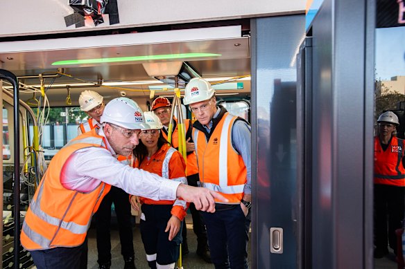 Premier Chris Minns tours the new metro train platform at Bankstown station on Monday.