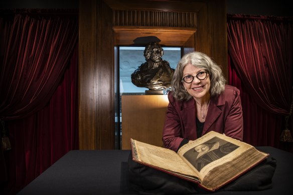 Rare books expert at the State Library of NSW Maggie Patton with Shakespeare’s First Folio.