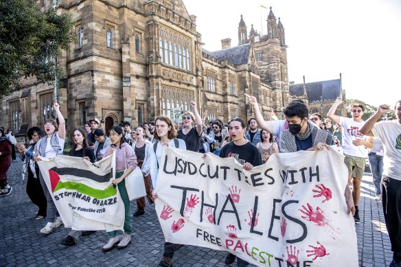 Sydney University students from the pro-Palestinian encampment march on campus.