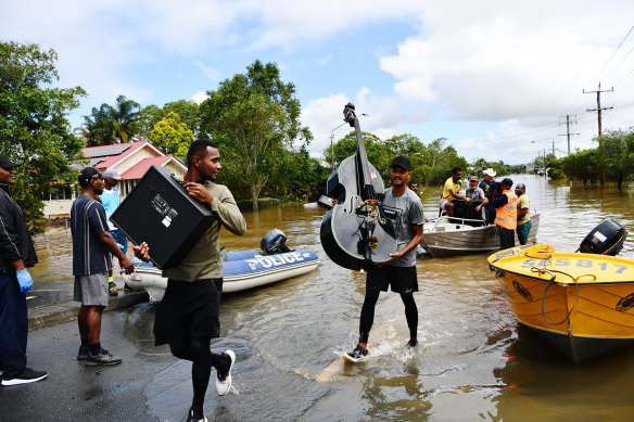 Residents recover whatever goods they can.