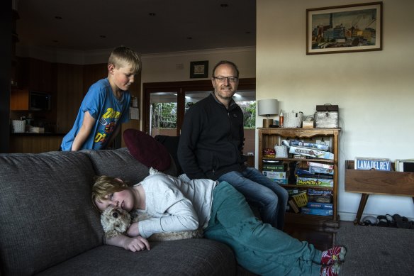 Alex Baumber with sons Leo, who is in year 4, and Simon, year 6. The family’s out-of-area applications for co-ed schools have been rejected.