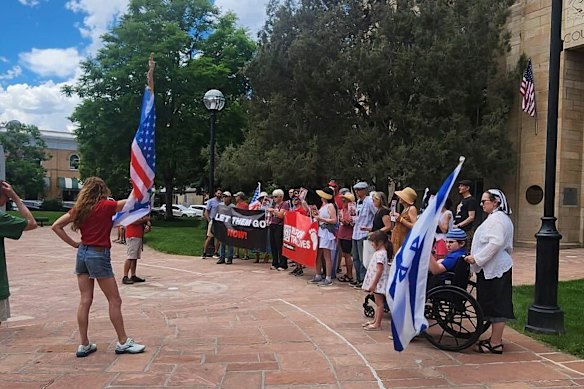 Run for Their Lives demonstrators gather at the start of their walk in Boulder on Sunday, before the attack.